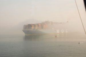 MOL Triumph emerges from the fog bank