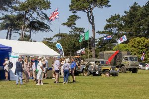 Marquees and a Military Vehicle display on the Clifftop